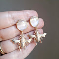 Aros mariposa blanca