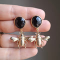 Aros mariposa negra